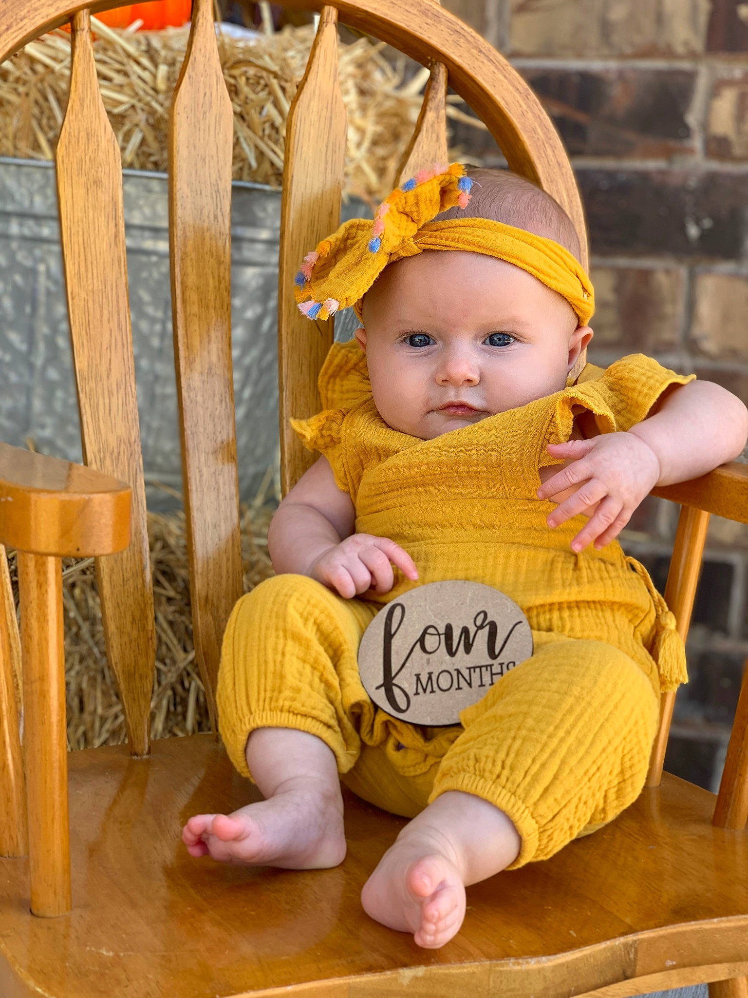 Oaklee is registered to the contest to win money with this photo: baby, baby_products, baby_toddler_clothing, cap, chair, cheek, child, comfort, eye, fashion_accessory, flooring, fun, happy, hardwood, headwear, person, product, room, sitting, skin