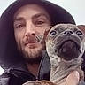 Lenny joined the competition — help win amazing prizes! adorable, beard, brown_fur, close_up, companion, cuddling, daylight, dog, french_bulldog, funny_expression, holding, hood, jacket, man, outdoor, pet, portrait, selfie, wide_eyes, wrinkled_face