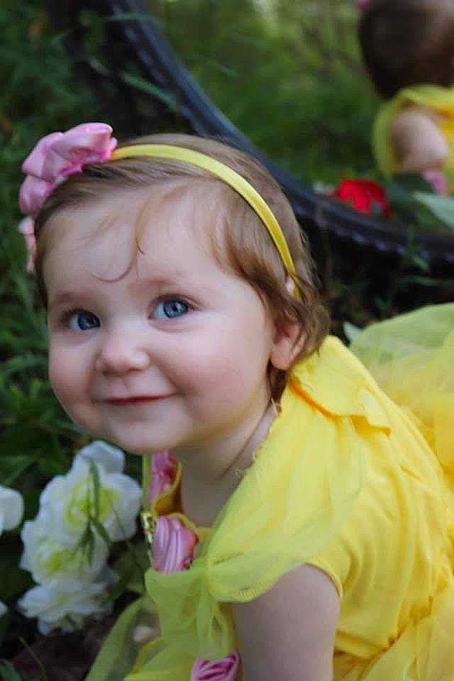 Payton joined the competition — help win amazing prizes! baby, baby_toddler_clothing, dress, eye, flower, fun, grass, hair_accessory, happy, headband, headpiece, iris, joy, lip, people_in_nature, person, petal, pink, plant, skin