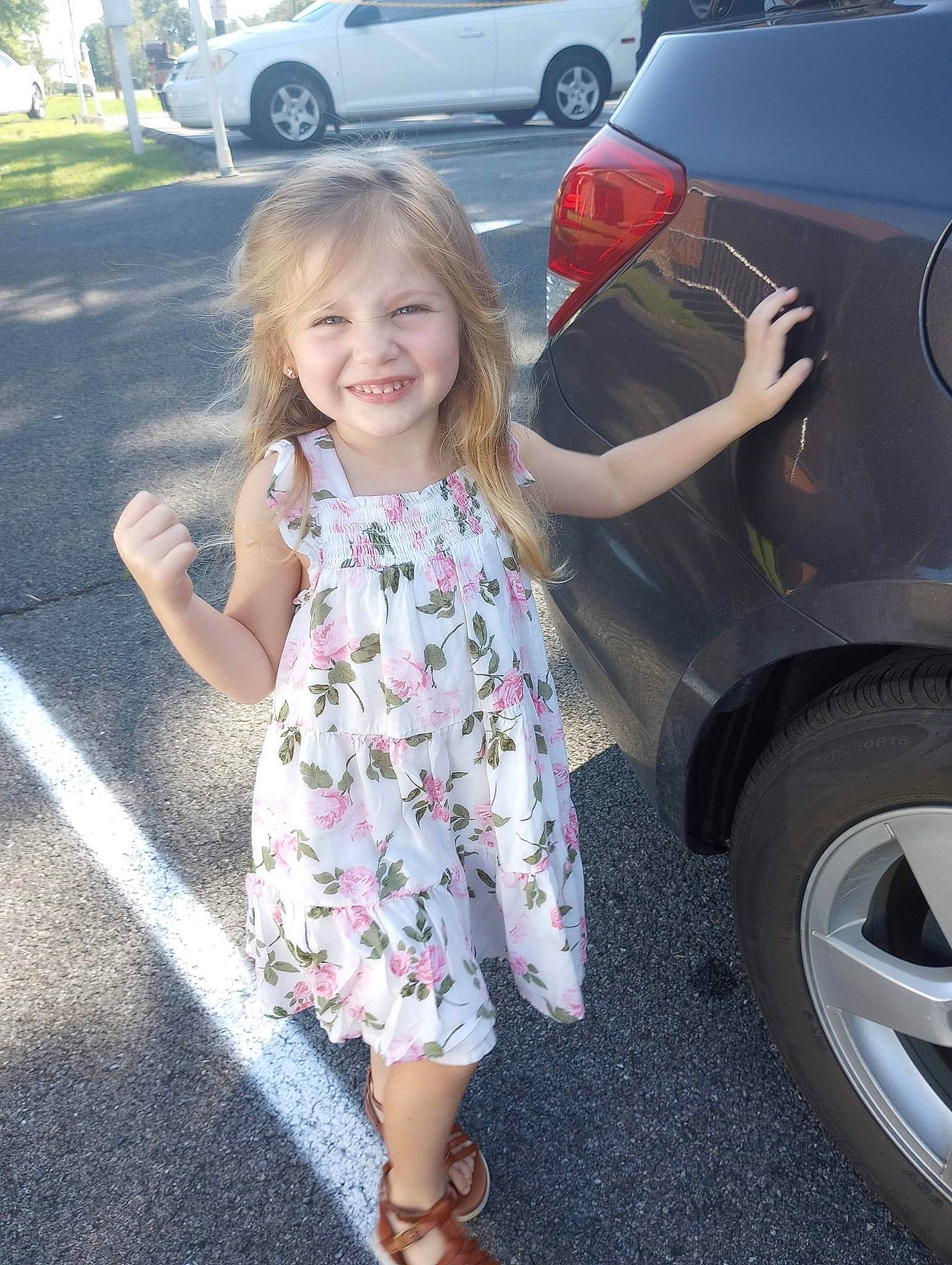 Payton joined the competition — help win amazing prizes! alloy_wheel, automotive_design, automotive_exterior, automotive_lighting, automotive_tire, black, bumper, car, cool, dress, fender, joy, leg, motor_vehicle, person, plant, rim, tire, vehicle, vehicle_door