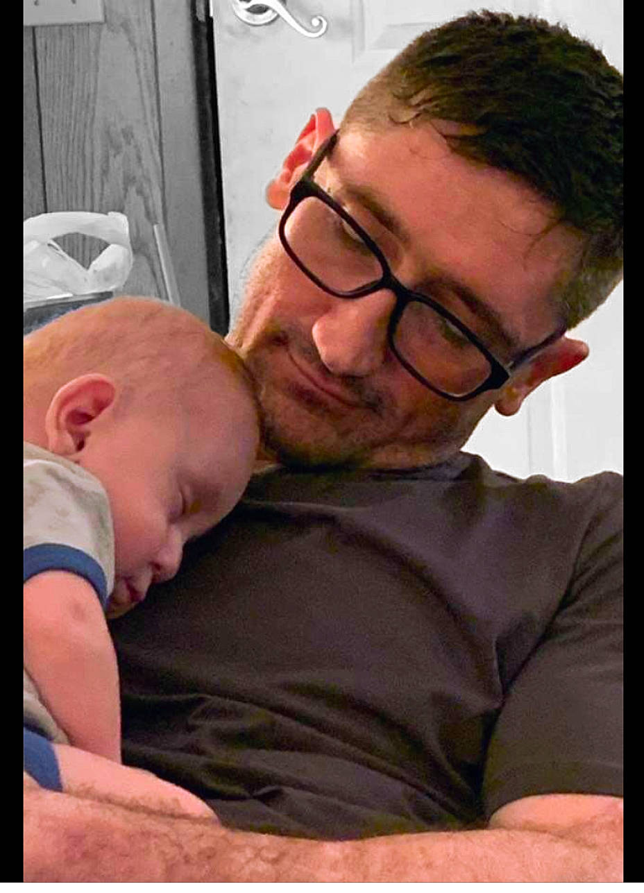 Roy is registered to the contest to win money with this photo: baby, beard, cheek, chin, comfort, ear, eyewear, forehead, gesture, glasses, happy, mouth, muscle, nose, person, skin, smile, snapshot, t_shirt, toddler