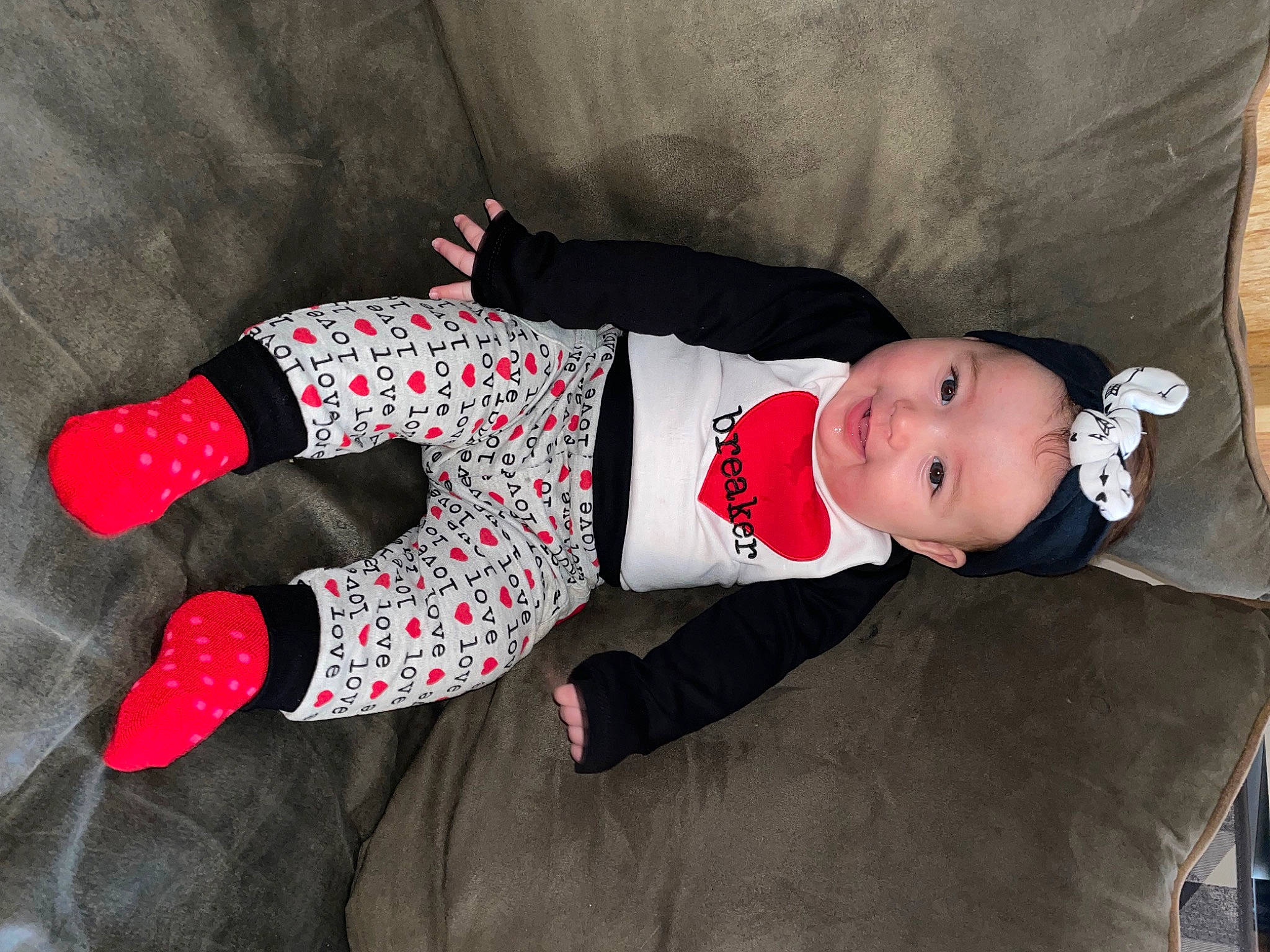 Paityn joined the competition — help win amazing prizes! baby, baby_products, baby_toddler_clothing, carmine, child, comfort, hat, headgear, headwear, human_leg, joy, linens, pattern, person, sleeve, sock, textile, toddler