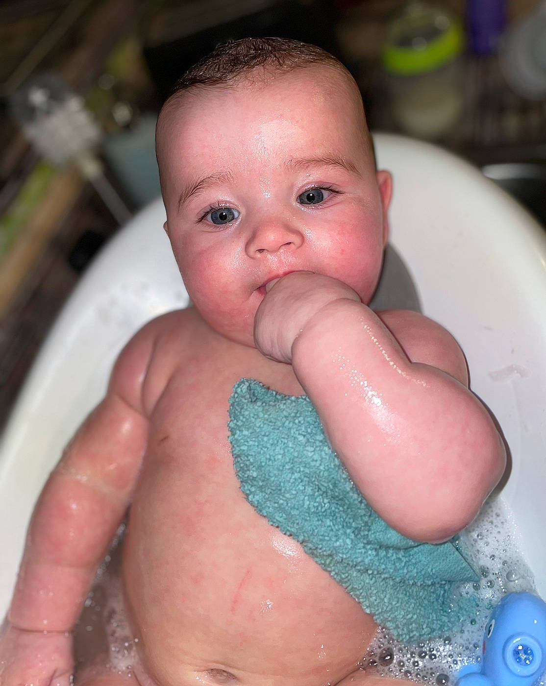 Paityn joined the competition — help win amazing prizes! baby, bathing, blue, cheek, chest, ear, eyelash, finger, gesture, hand, head, human_body, lip, mouth, nail, nose, person, skin, stomach, thumb
