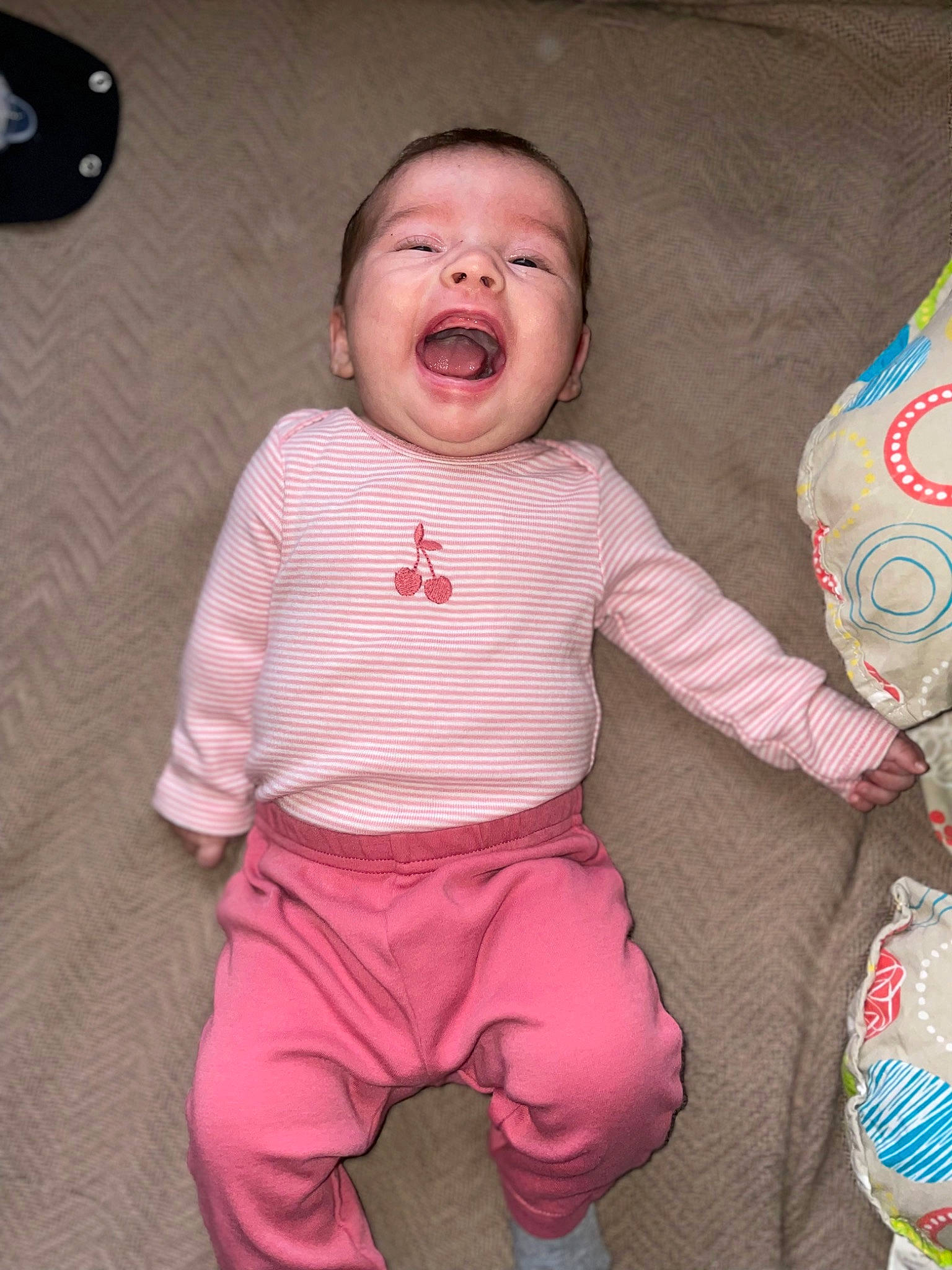 Paityn is registered to the contest to win money with this photo: baby, baby_toddler_clothing, cheek, cool, eye, finger, happy, head, human_body, joint, lip, mouth, neck, nose, person, pink, skin, sleeve, t_shirt, textile