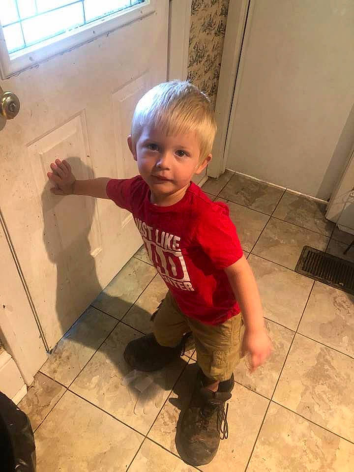 Ryland is registered to the contest to win money with this photo: baby, baby_toddler_clothing, child, door, floor, flooring, foot, fun, happy, hardwood, person, play, room, sleeve, standing, t_shirt, thumb, toddler, window, wood