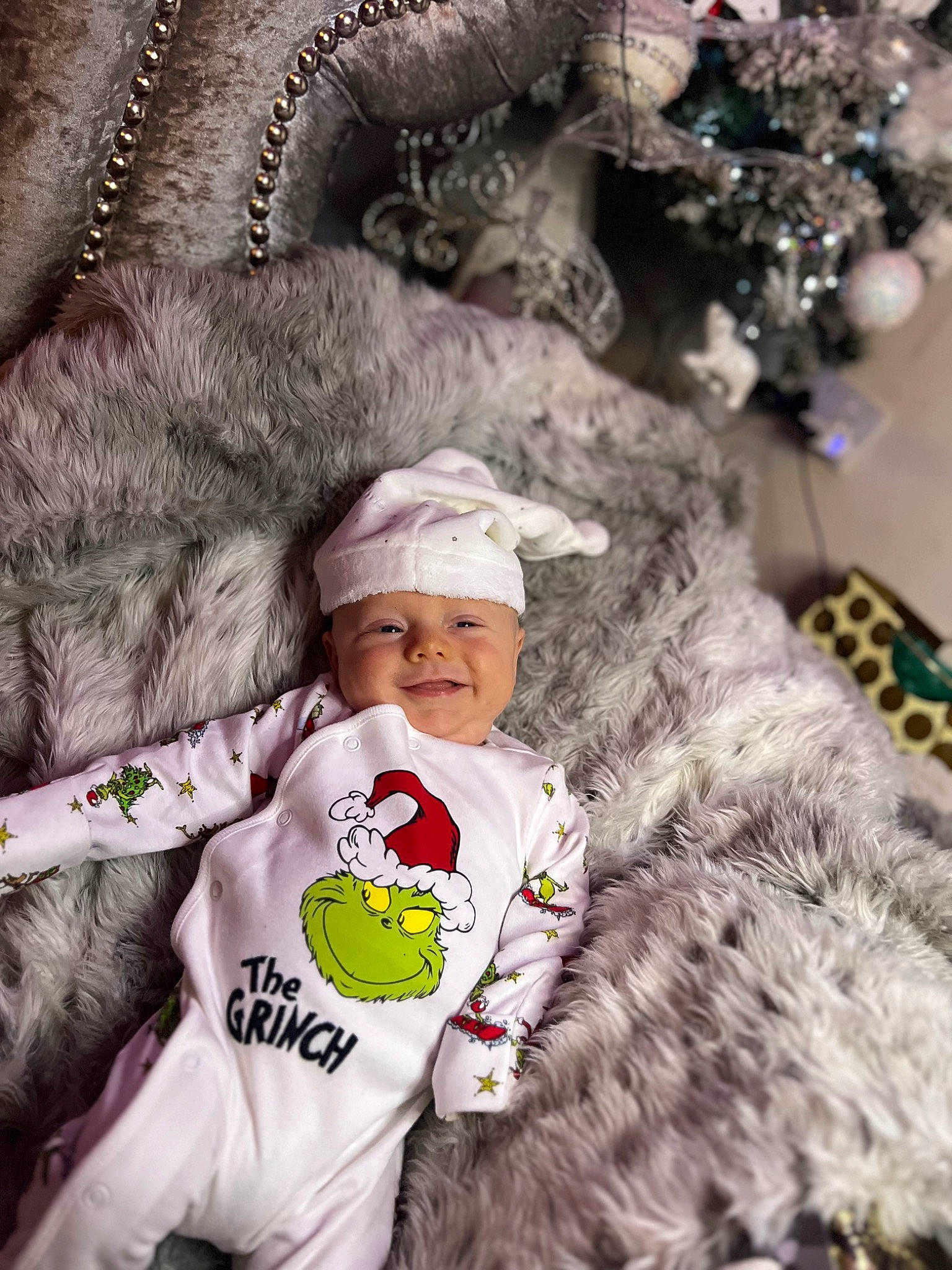 Kolby joined the competition — help win amazing prizes! child, christmas, christmas_tree, conifer, event, fun, fur, fur_clothing, happy, headwear, holiday, joy, mammal, ornament, people, person, photograph, smile, snapshot, toddler