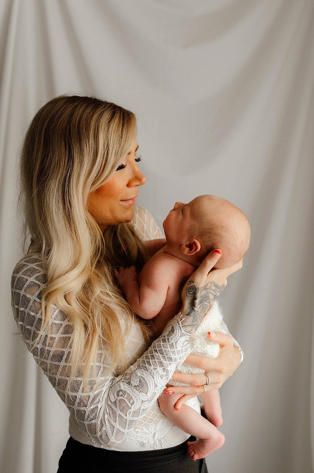 Kolby is registered to the contest to win money with this photo: abdomen, baby, child, comfort, elbow, event, flash_photography, gesture, happy, hug, jewellery, joint, love, neck, person, portrait_photography, romance, sitting, skin, smile