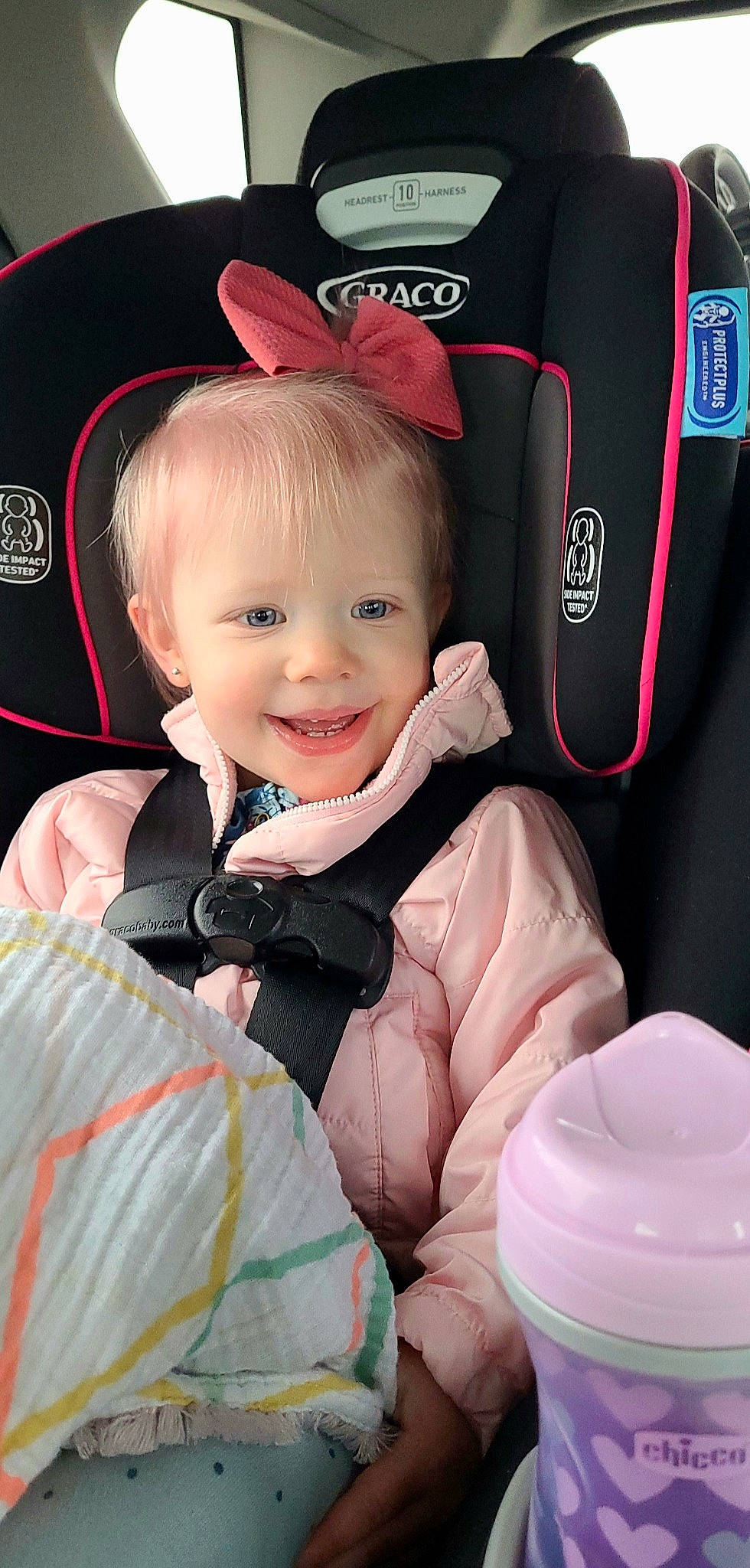 Brynna joined the competition — help win amazing prizes! auto_part, baby, baby_carriage, baby_in_car_seat, baby_products, baby_toddler_clothing, car_seat, cheek, child, comfort, eye, fashion_accessory, happy, joy, magenta, person, pink, product, smile, thumb