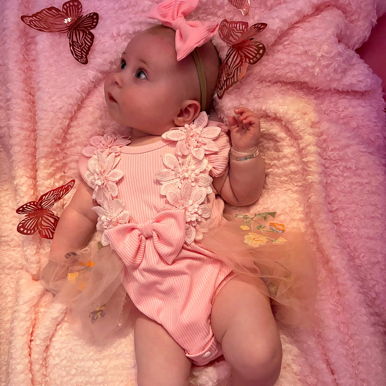 Tahleah joined the competition — help win amazing prizes! adorable, baby, blanket, bow, butterflies, child, cute, decorative, floral, headband, indoor, infant, looking_up, lying_down, pastel_colors, pink_clothing, portrait, small_person, soft_texture, tutu