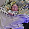 Preston joined the competition — help win amazing prizes! baby, infant, child, portrait, face, eyes_open, lying_down, blanket, swaddle, bed, bedding, onesie, clothing, indoor, cozy, home, nursery, sleeping_area, cute, photography