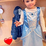 Mahelya a rejoint le concours — aidez-le/la à gagner de superbes lots ! child, girl, princess_dress, blue_dress, headband, pink_shoes, smile, cubby, coat, shoes, wooden_furniture, indoor, cute, playful, heart_emoji, portrait, costume, young_child, standing, happy