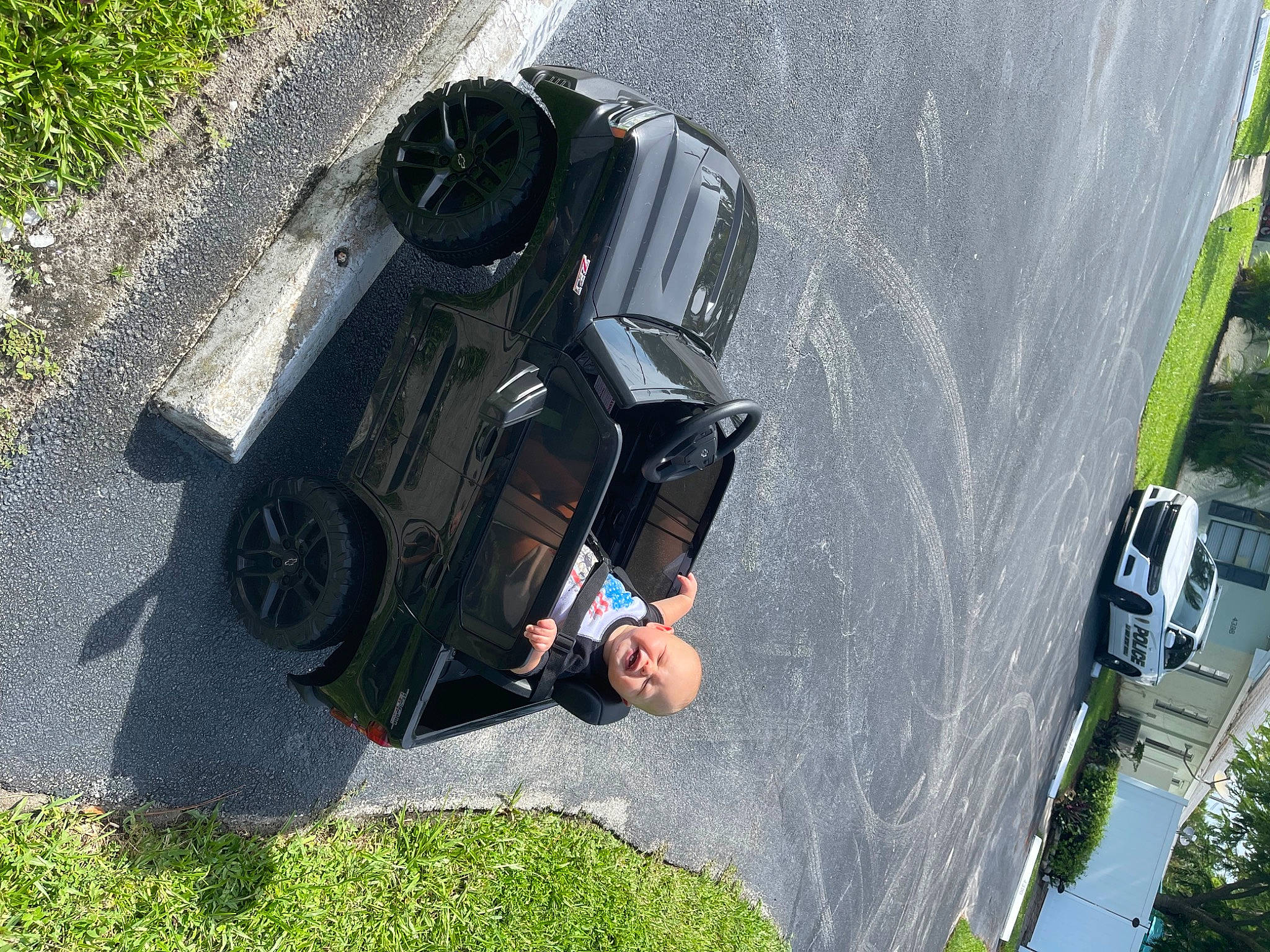 Hudson joined the competition — help win amazing prizes! asphalt, auto_part, automotive_design, automotive_exterior, automotive_lighting, automotive_tire, automotive_wheel_system, bumper, car, fender, grass, hood, land_vehicle, motor_vehicle, person, plant, road_surface, tire, vehicle, vehicle_door