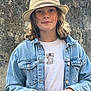 Lyliana a rejoint le concours — aidez-le/la à gagner de superbes lots ! casual, child, denim_jacket, expression, face, fashion, grip, hands, hat, kitten_print, light, long_hair, nature, outdoor, portrait, shirt, standing, stone_wall, texture, young_person