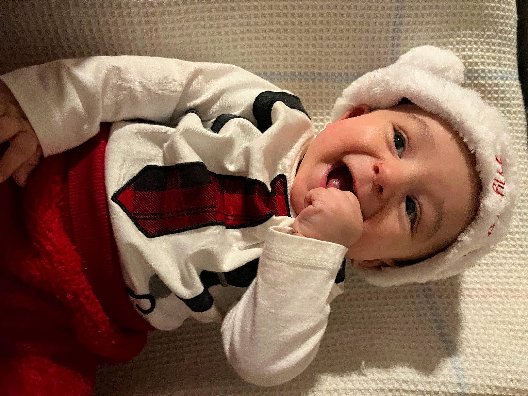 Mikey joined the competition — help win amazing prizes! baby, baby_sleeping, baby_toddler_clothing, cap, carmine, cheek, child, christmas, comfort, eye, eyelash, fur, gesture, happy, human_body, lip, mouth, person, sleeve, smile