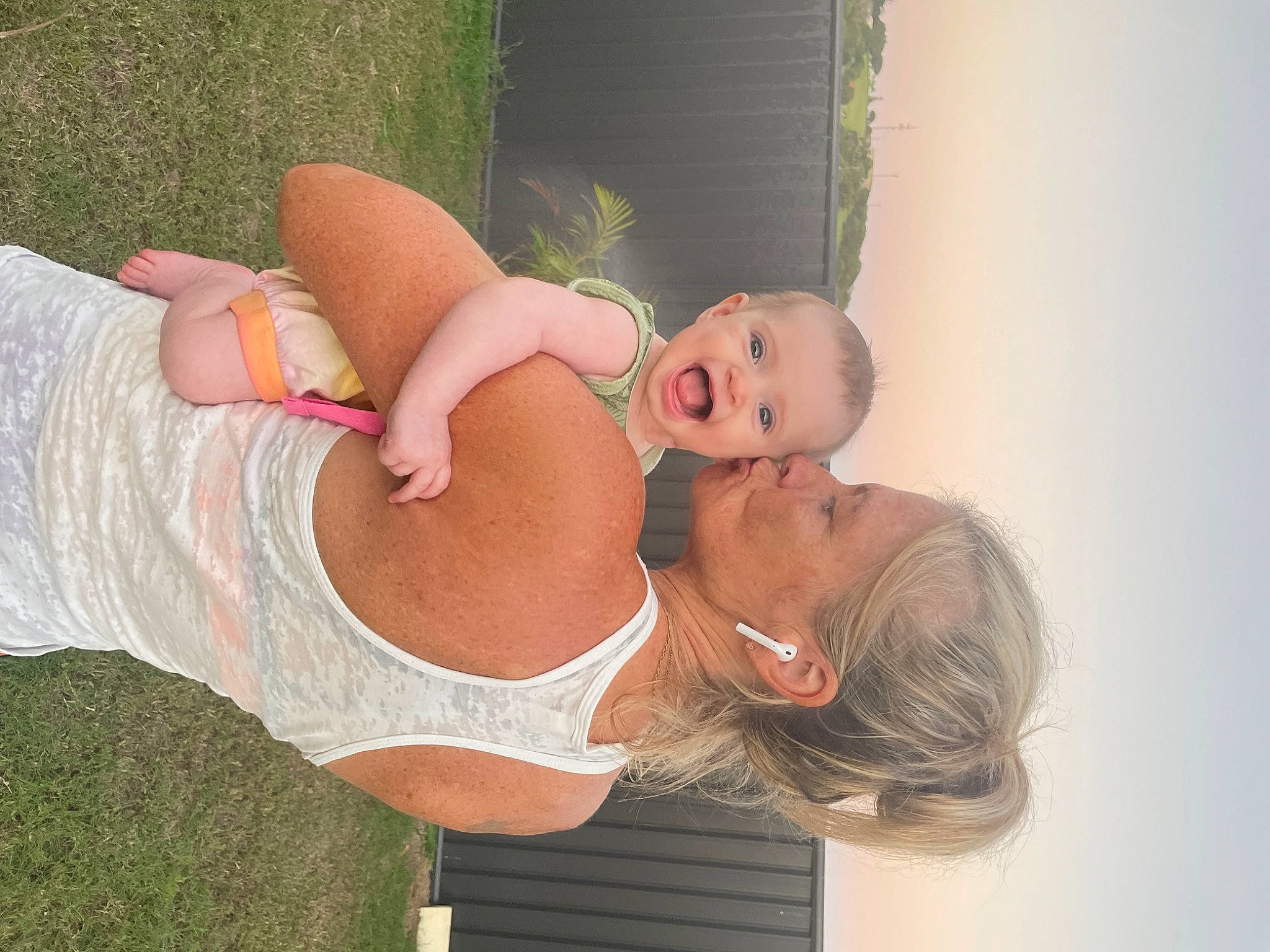 Willow is registered to the contest to win money with this photo: abdomen, baby, brassiere, chest, elbow, gesture, grass, happy, human_leg, jewellery, joint, leisure, navel, person, plant, shoulder, smile, stomach, thigh, trunk