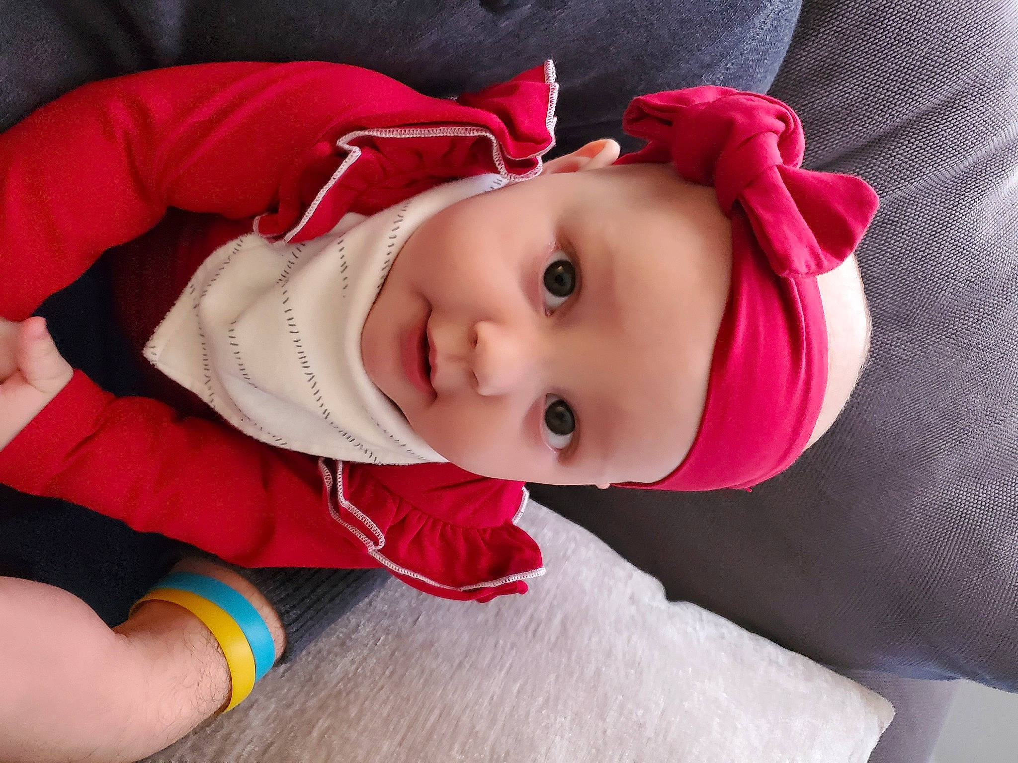Carolina is registered to the contest to win money with this photo: baby, baby_products, baby_toddler_clothing, carmine, cheek, child, comfort, eye, fur, hat, head, headwear, lip, magenta, pattern, person, pink, product, sitting, skin