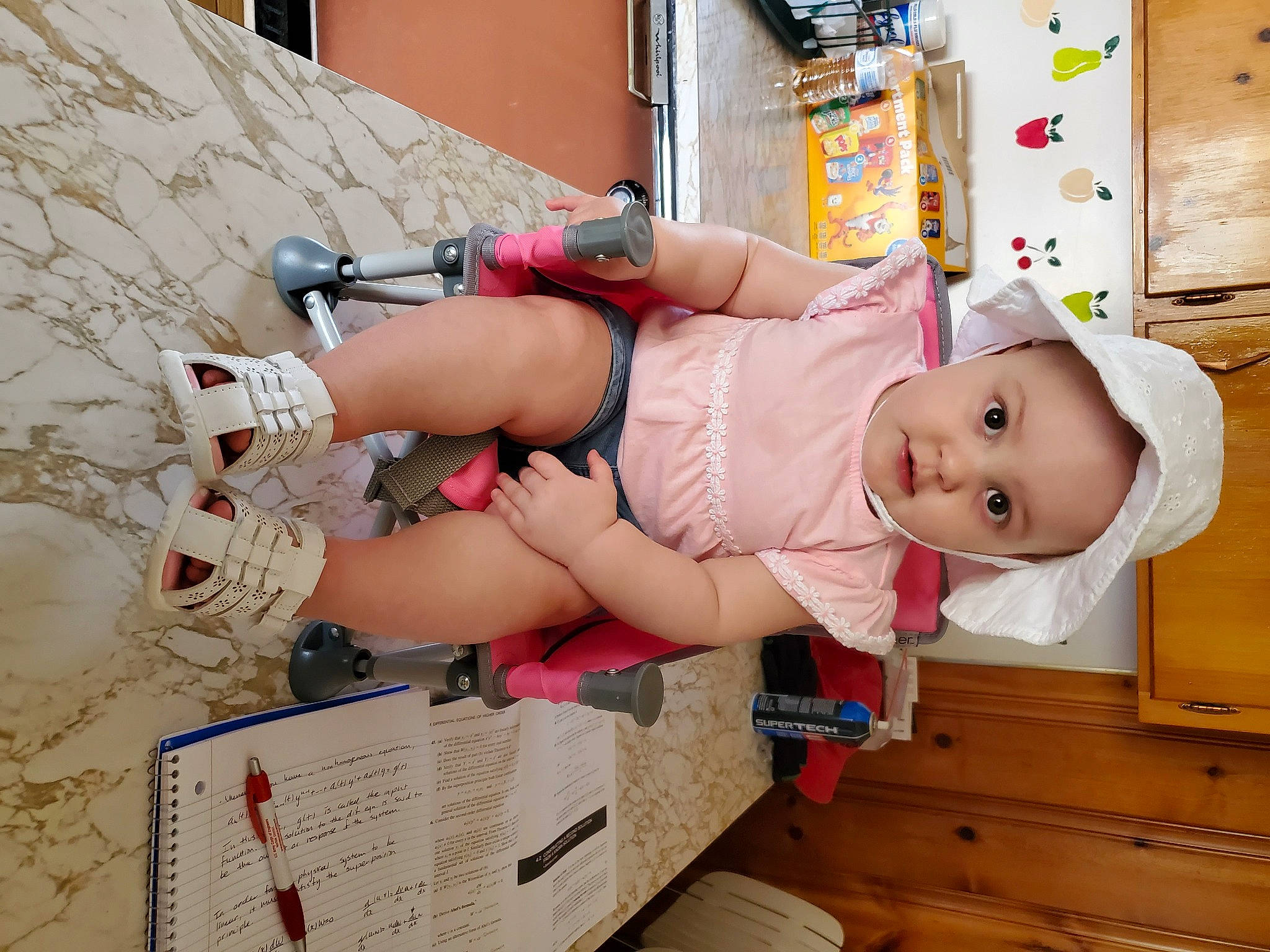 Carolina is registered to the contest to win money with this photo: abdomen, baby, baby_safety, baby_toddler_clothing, child, diaper, fun, hat, headwear, human_leg, knee, leg, person, pink, sandal, shorts, smile, thigh, tire, toddler