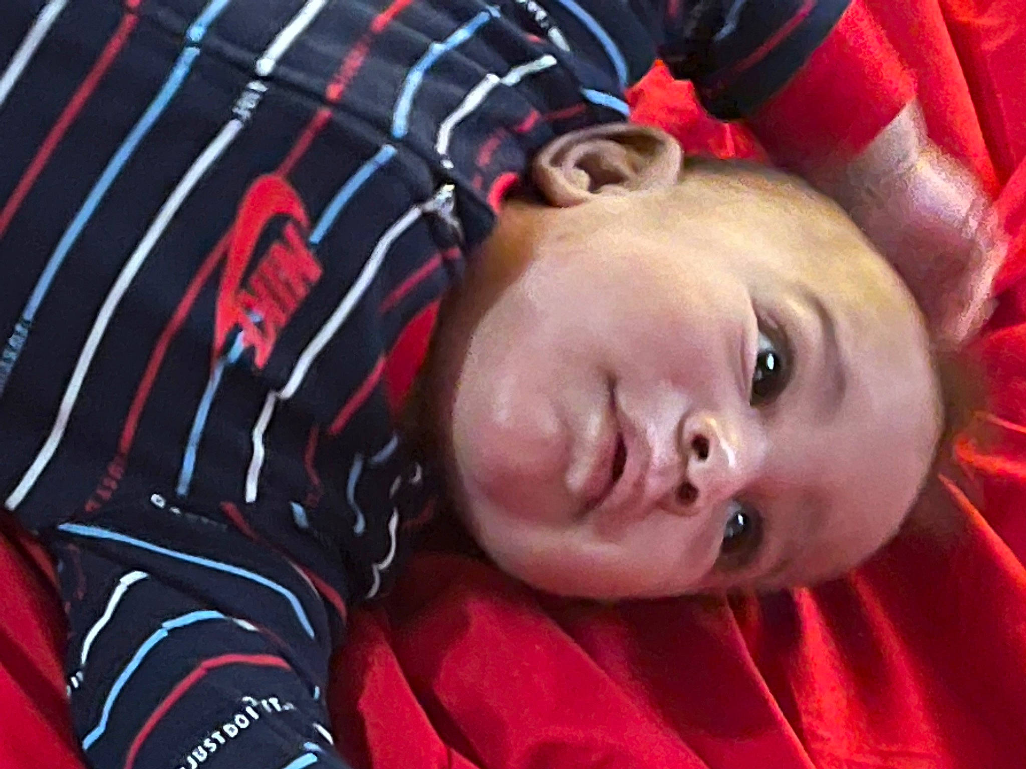 Malachi joined the competition — help win amazing prizes! baby, baby_toddler_clothing, cheek, child, comfort, eyebrow, eyelash, fun, happy, lip, magenta, mouth, nose, pattern, person, red, skin, sleeve, smile, textile