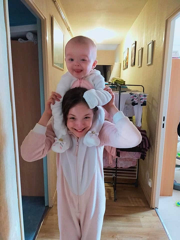 Lindsay participe au concours pour gagner de l'argent avec cette photo : baby, child, costume, joint, joy, person, pink, product, room, shoulder, skin, standing, toddler, vacation