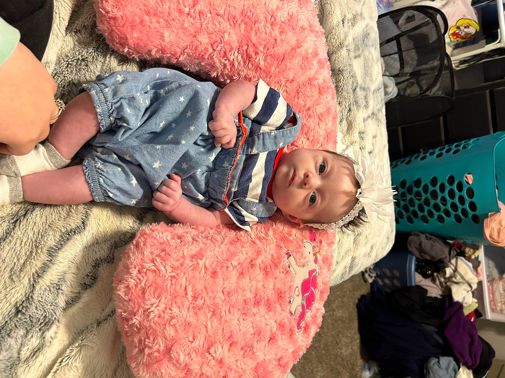 Annaleigh is registered to the contest to win money with this photo: abdomen, child, comfort, fashion_accessory, flesh, flooring, fun, happy, human_leg, leisure, linens, luggage_and_bags, nap, pattern, person, room, sitting, sleep, textile, thigh