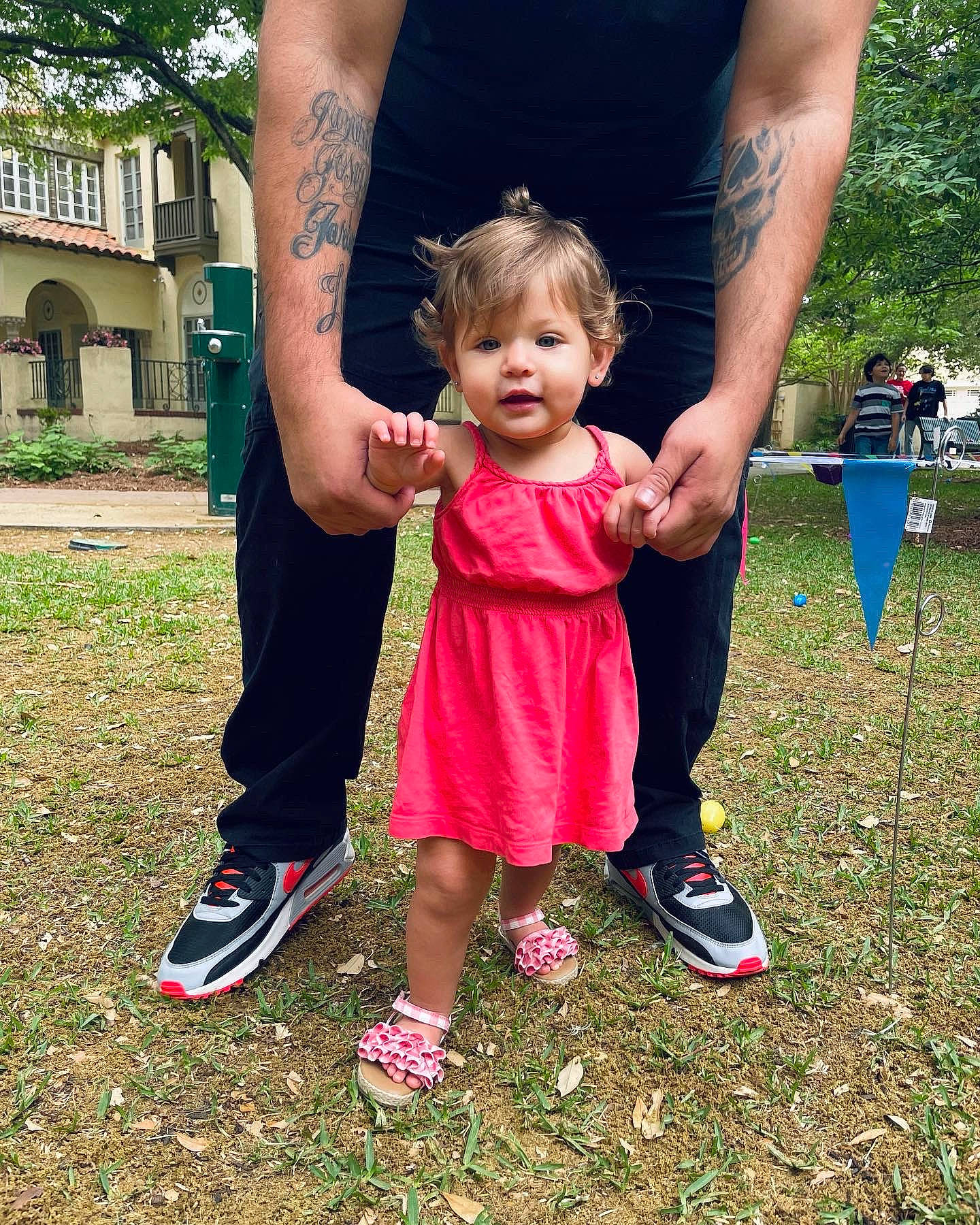 Luella is registered to the contest to win money with this photo: arm, child, event, footwear, fun, gesture, grass, happy, lawn, leg, leisure, magenta, people_in_nature, person, plant, recreation, shoe, shorts, sneakers, toddler