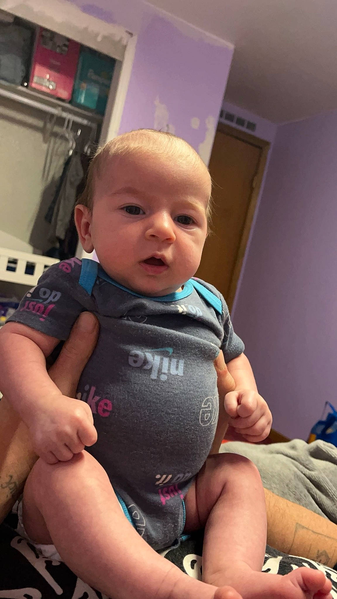 Kingston is registered to the contest to win money with this photo: abdomen, baby, baby_toddler_clothing, cheek, chest, child, comfort, eye, finger, fun, gesture, happy, joint, knee, leg, person, skin, thigh, thumb, toddler