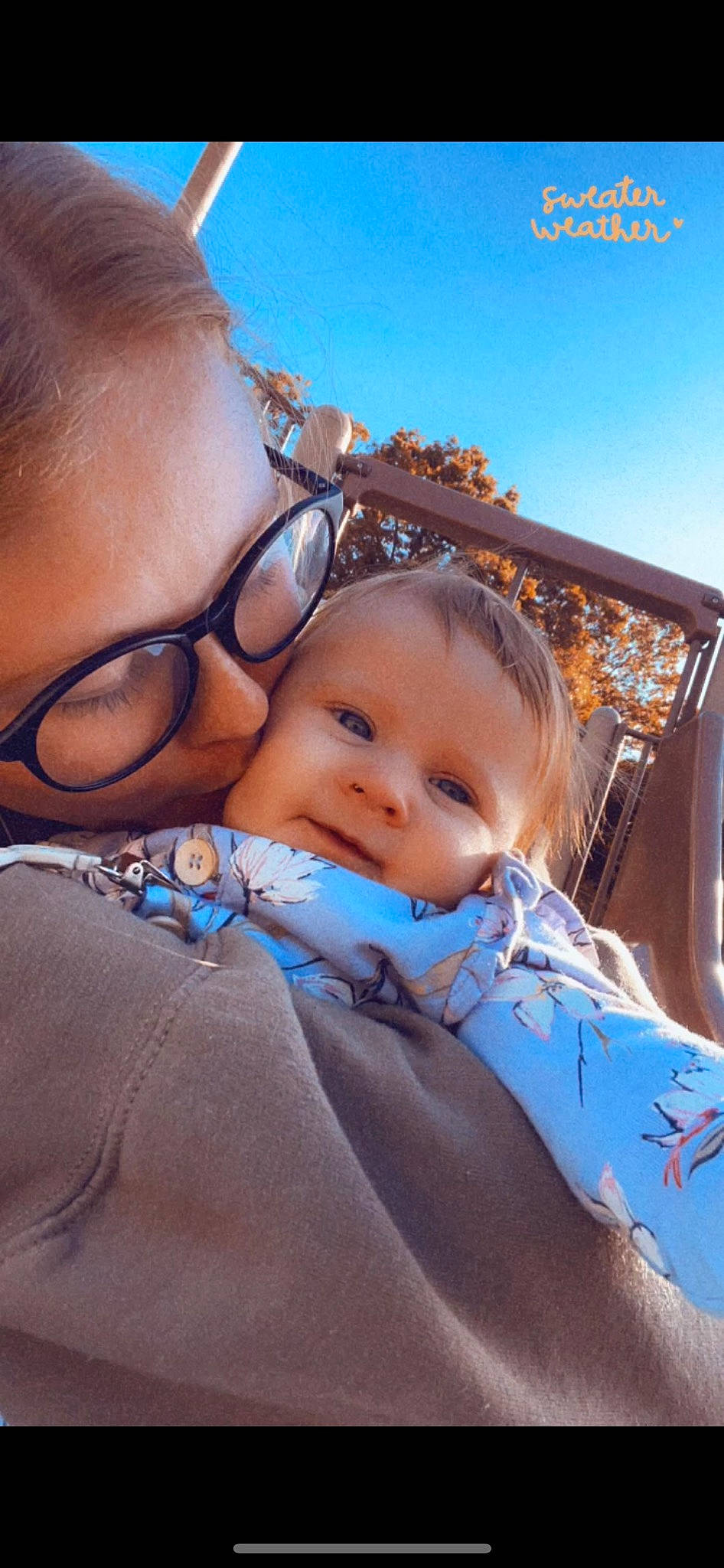 Maeve is registered to the contest to win money with this photo: azure, cheek, cool, eyewear, face, facial_expression, finger, glasses, hairstyle, happy, iris, lip, mouth, neck, nose, person, shoulder, skin, sky, toddler