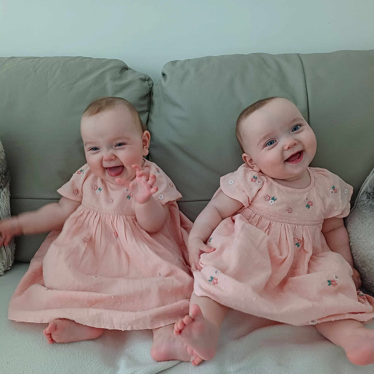 Lily And Poppy is registered to the contest to win money with this photo: architecture, baby, babylaughing, building, clothing, couch, crib, cushion, dress, face, furniture, happy, head, homedecor, indoors, infantbed, person, photography, portrait, smile