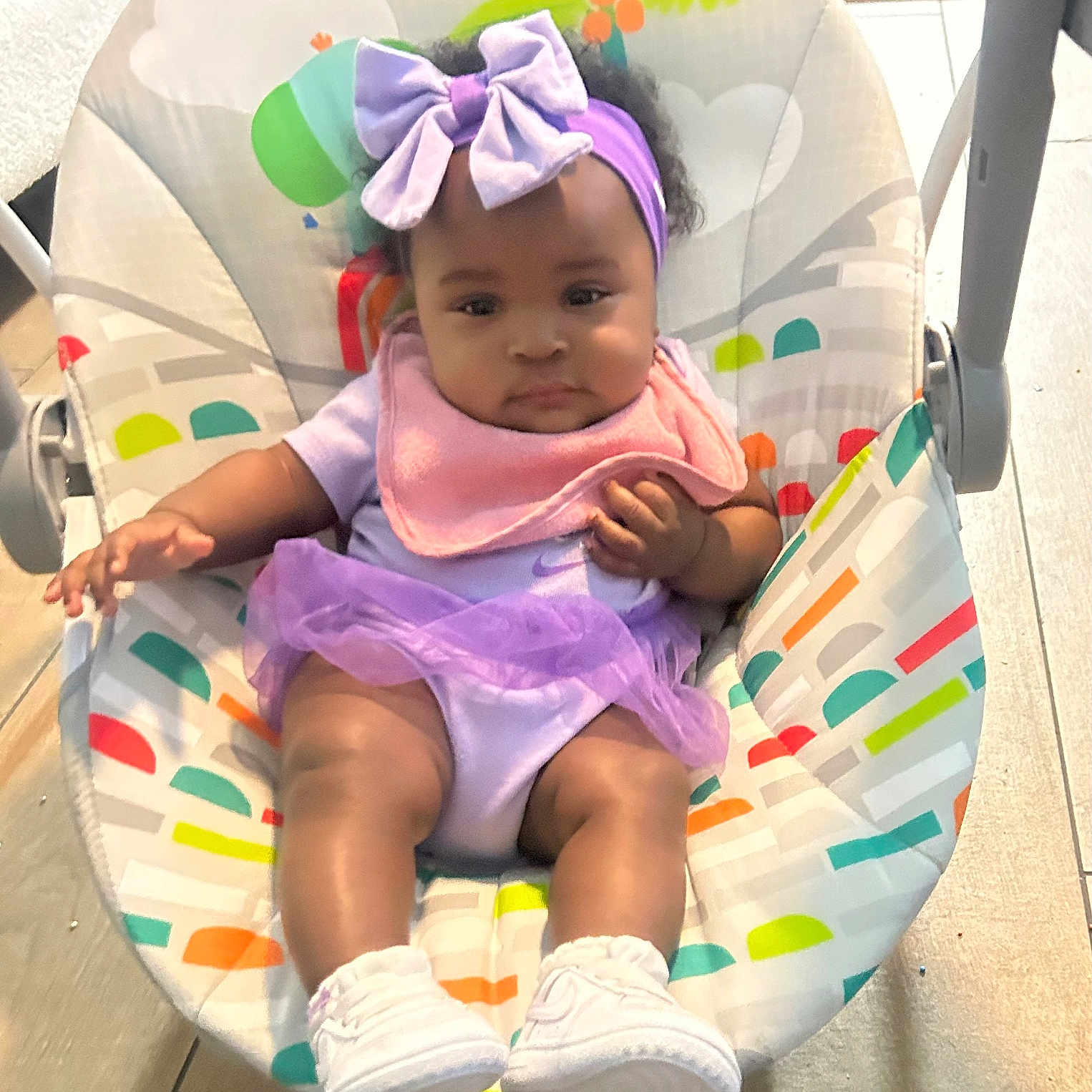 Kourtnee joined the competition — help win amazing prizes! baby, chair, clothing, diaper, face, footwear, furniture, happy, hat, head, infantbed, person, photography, portrait, racket, shoe, sitting, sport, tennis, tennisracket