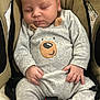 baby, sleeping, car_seat, onesie, bear_design, child, infant, clothing, cute, peaceful, seatbelt, hands, face, portrait, indoor, comfort, nap, adorable, head, relaxation