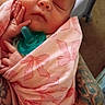 Ila is registered to the contest to win money with this photo: arms, baby, bassinet, blanket, closed_eyes, cozy, face, hand, indoors, infant, newborn, nursery, pacifier, peaceful, pink, portrait, sleeping, soft_blanket, swaddled, tattoo