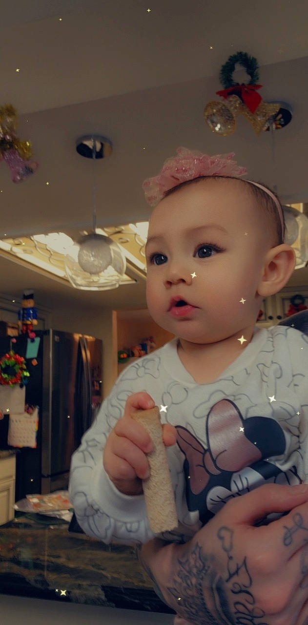 Nevaeh Flynn joined the competition — help win amazing prizes! baby, baby_toddler_clothing, ceiling, cheek, child, event, eyelash, fashion_accessory, fun, gesture, nail, party_supply, person, pink, room, sitting, skin, thumb, toddler, toy