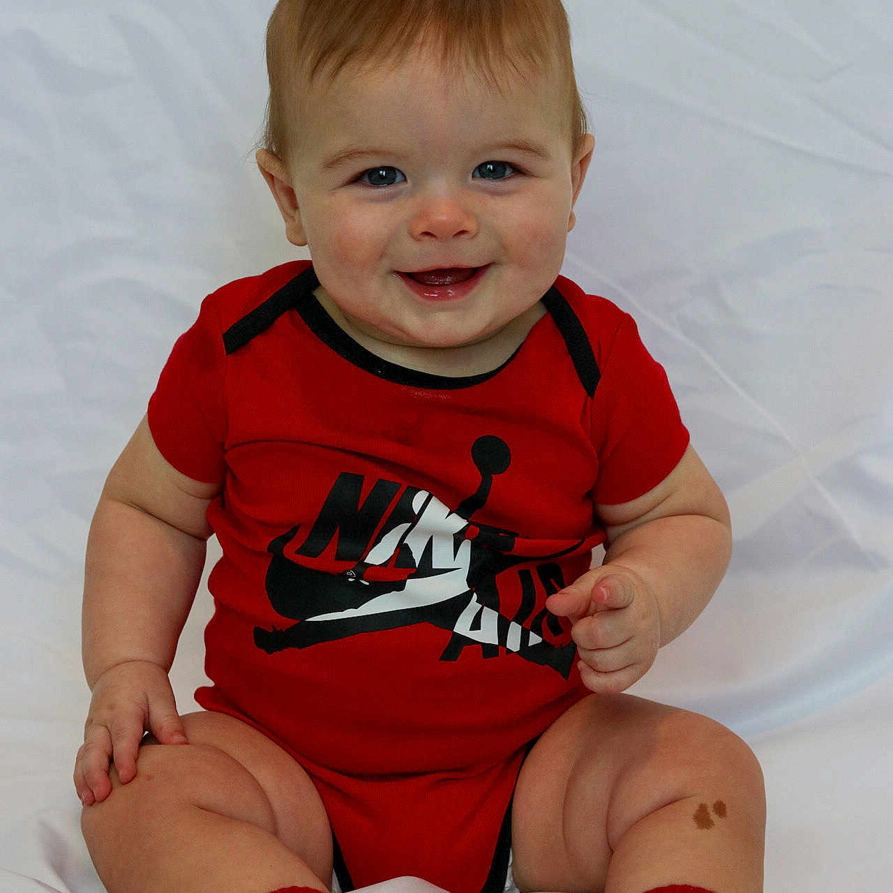 Aven joined the competition — help win amazing prizes! applique, baby, bodypart, clothing, couch, face, finger, footwear, hand, head, pattern, person, photography, portrait, runningshoe, shoe, shorts, sitting, sneaker, t_shirt