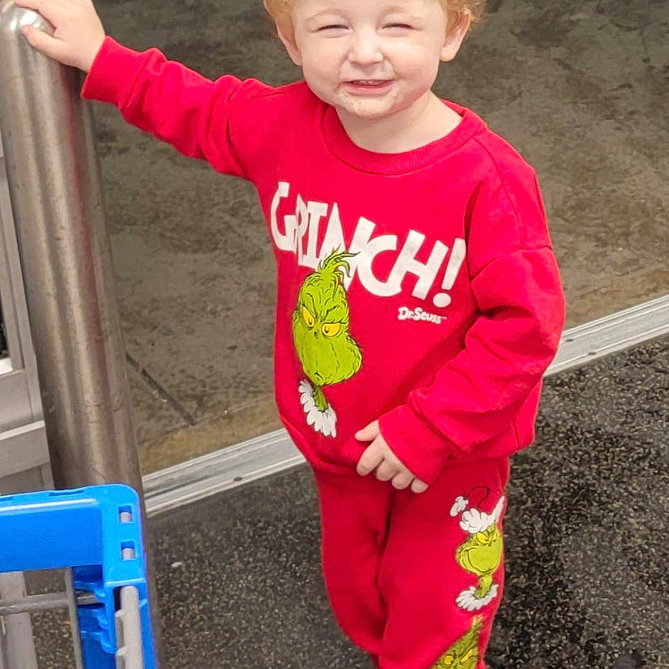 Colton is registered to the contest to win money with this photo: boy, child, city, clothing, face, footwear, head, male, outdoorplayarea, outdoors, pants, person, photography, playarea, portrait, road, shoe, street, t_shirt, urban