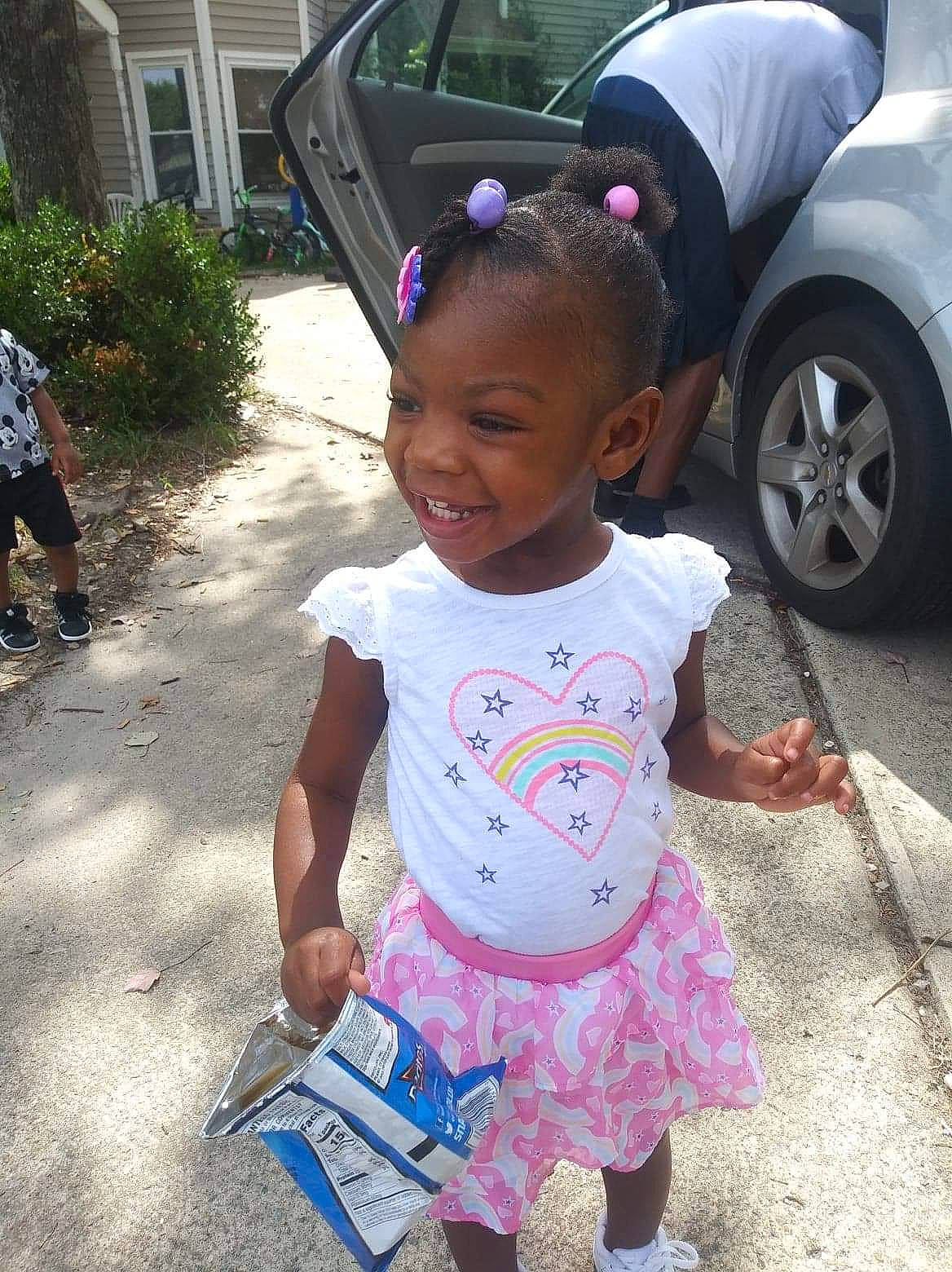 Carmen joined the competition — help win amazing prizes! alloy_wheel, auto_part, automotive_tire, automotive_wheel_system, baby_toddler_clothing, child, city_car, family_car, fender, hubcap, joy, person, pink, purple, rim, tire_care, toddler, vehicle_door