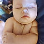 baby, sleeping, arms_crossed, indoors, chubby, face, head, skin, person, infant, peaceful, portrait, child, young, relaxed, closed_eyes, flesh, cute, resting, napping