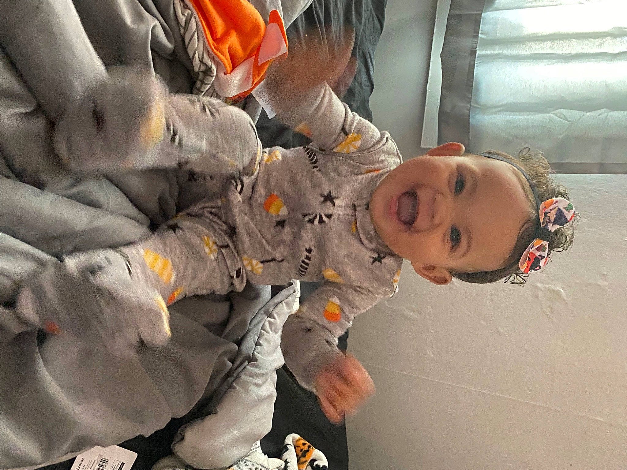 Deziriah Nicole joined the competition — help win amazing prizes! aerospace_engineering, astronaut, auto_part, baby, child, gesture, glove, military, person, personal_protective_equipment, smile, sports_gear, toddler, uniform
