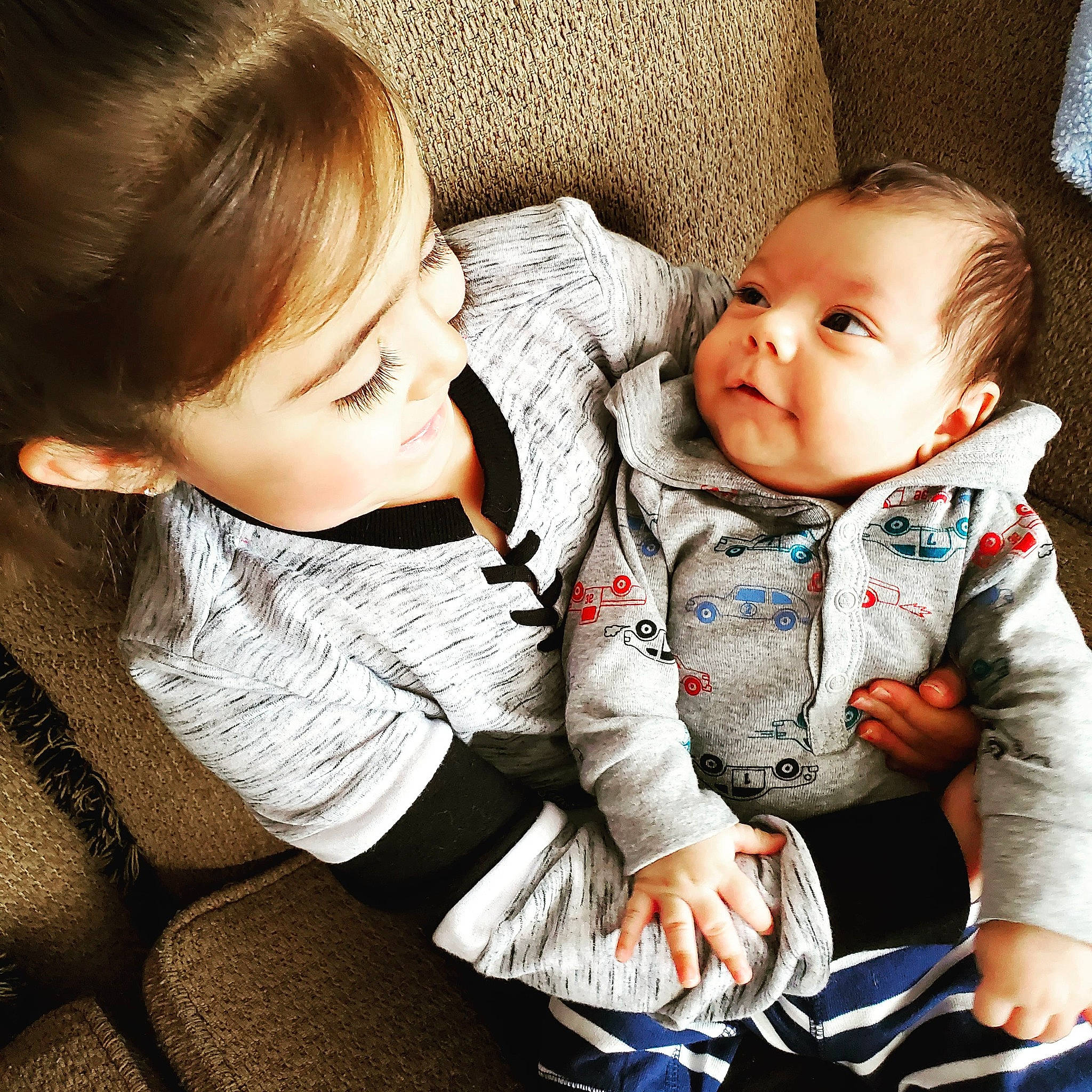 Ambrose is registered to the contest to win money with this photo: baby, cheek, child, comfort, gesture, nose, person, sibling, sitting, skin, smile, toddler