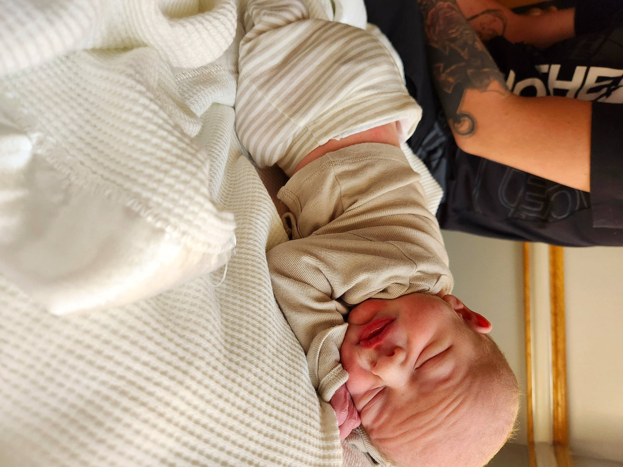 Bryson joined the competition — help win amazing prizes! abdomen, arm, baby, child, comfort, elbow, finger, gesture, happy, human_leg, joint, knee, leg, linens, person, room, sitting, sleeve, sorrow, sunglasses