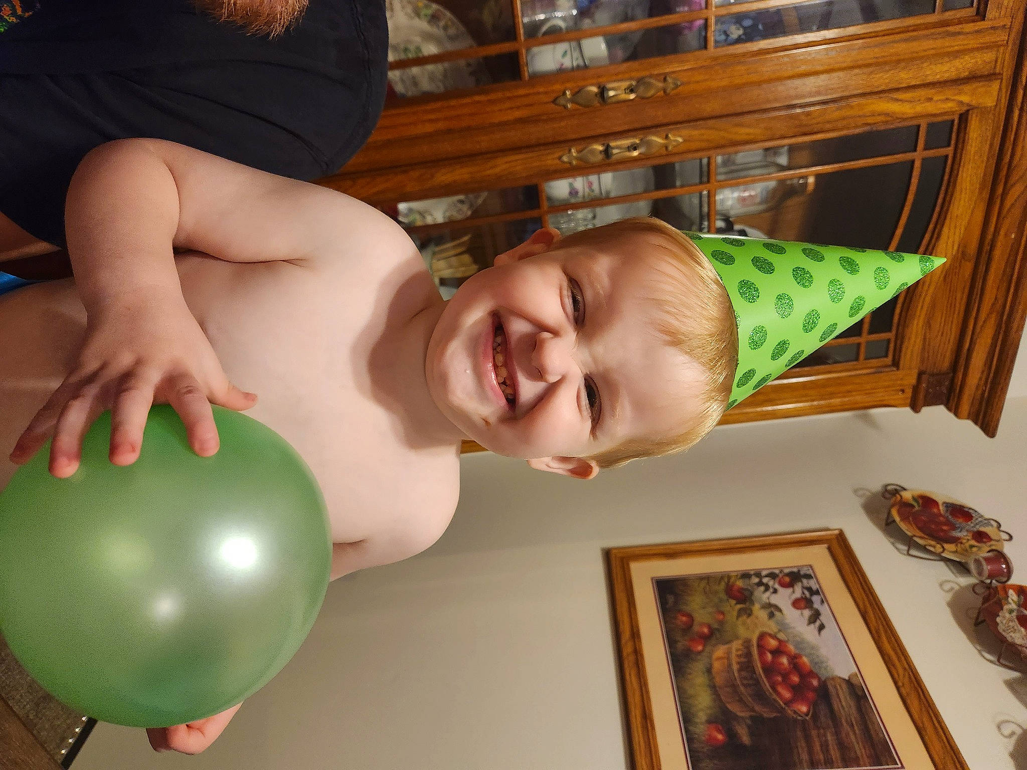 Elijah joined the competition — help win amazing prizes! abdomen, balloon, cabinetry, chest, child, cupboard, drawer, fun, happy, hardwood, joy, laugh, party_supply, person, picture_frame, room, smile, standing, toddler, varnish