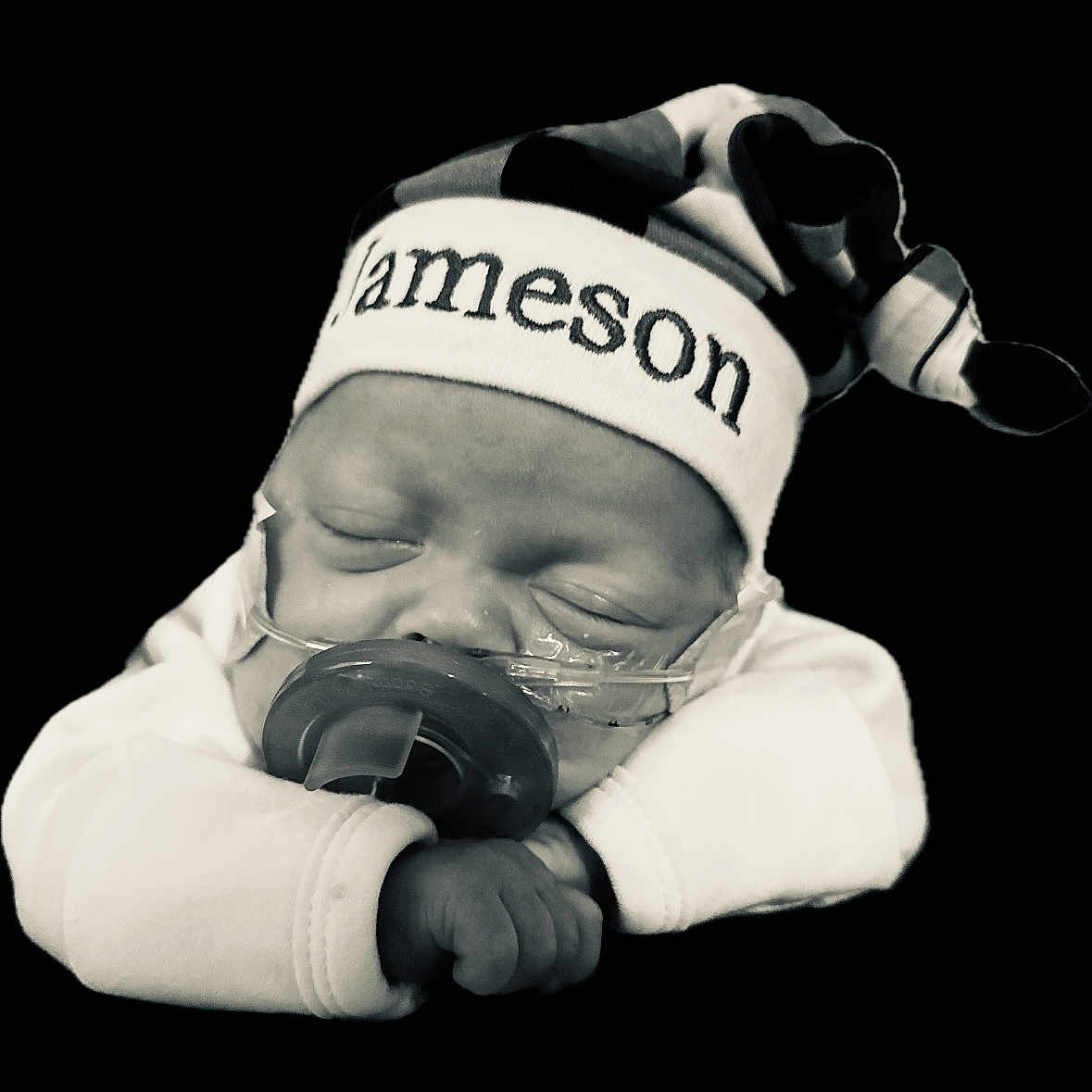 Jameson joined the competition — help win amazing prizes! baby, baseballcap, beanie, bodypart, bonnet, cap, clothing, electronics, face, finger, glove, hand, hat, head, newborn, person, photographer, photography, portrait, sleeping