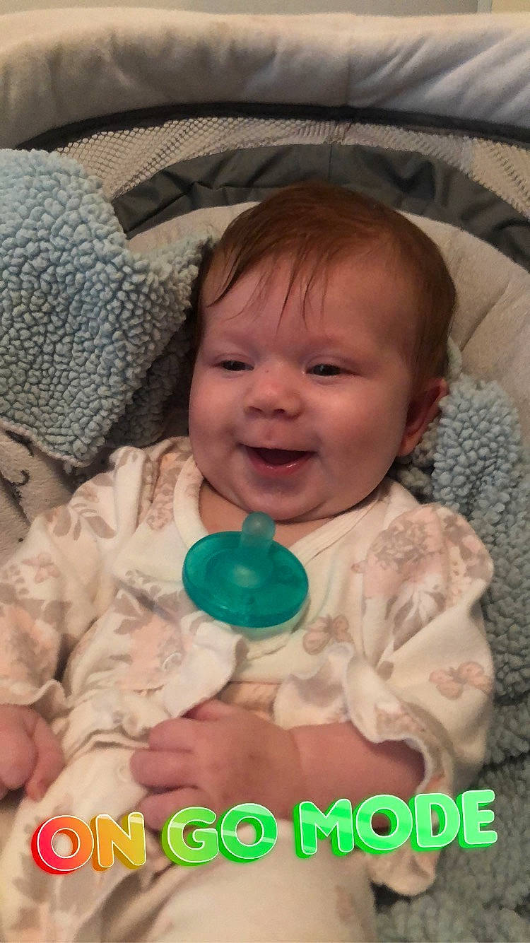 Lucille is registered to the contest to win money with this photo: arm, baby, baby_toddler_clothing, cheek, child, comfort, happy, head, iris, joy, mammal, mouth, nose, organ, person, pink, product, skin, smile, textile