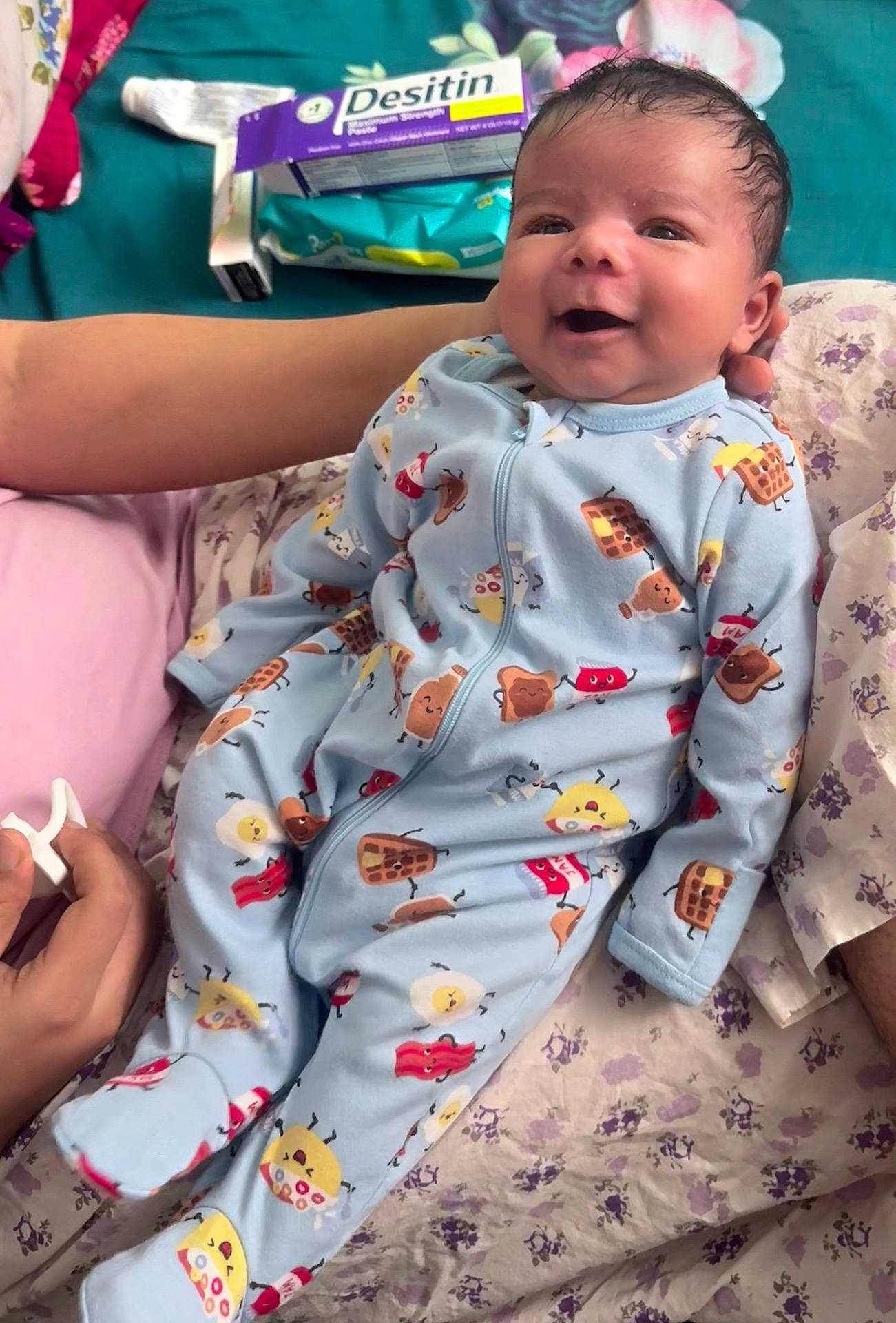 Zayan joined the competition — help win amazing prizes! baby, babycare, bed, bedspread, clothing, cute, fabric, face, hand, happy, head, indoors, infant, lying, newborn, onesie, person, product, skin, smiling