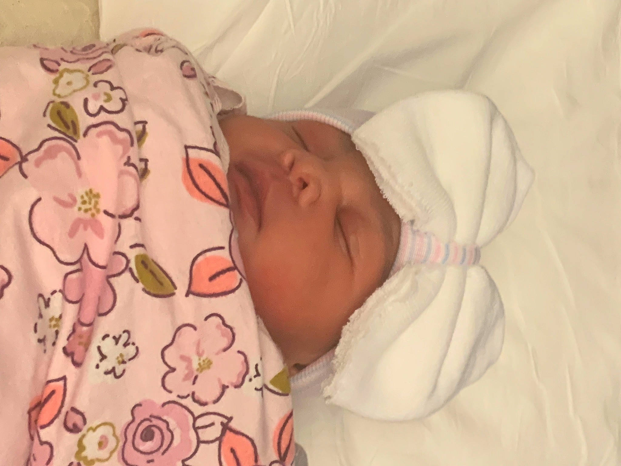 Miracle is registered to the contest to win money with this photo: baby, baby_sleeping, baby_toddler_clothing, cheek, child, comfort, eyelash, facial_expression, finger, hand, head, linens, lip, mouth, nose, person, petal, pink, skin, textile