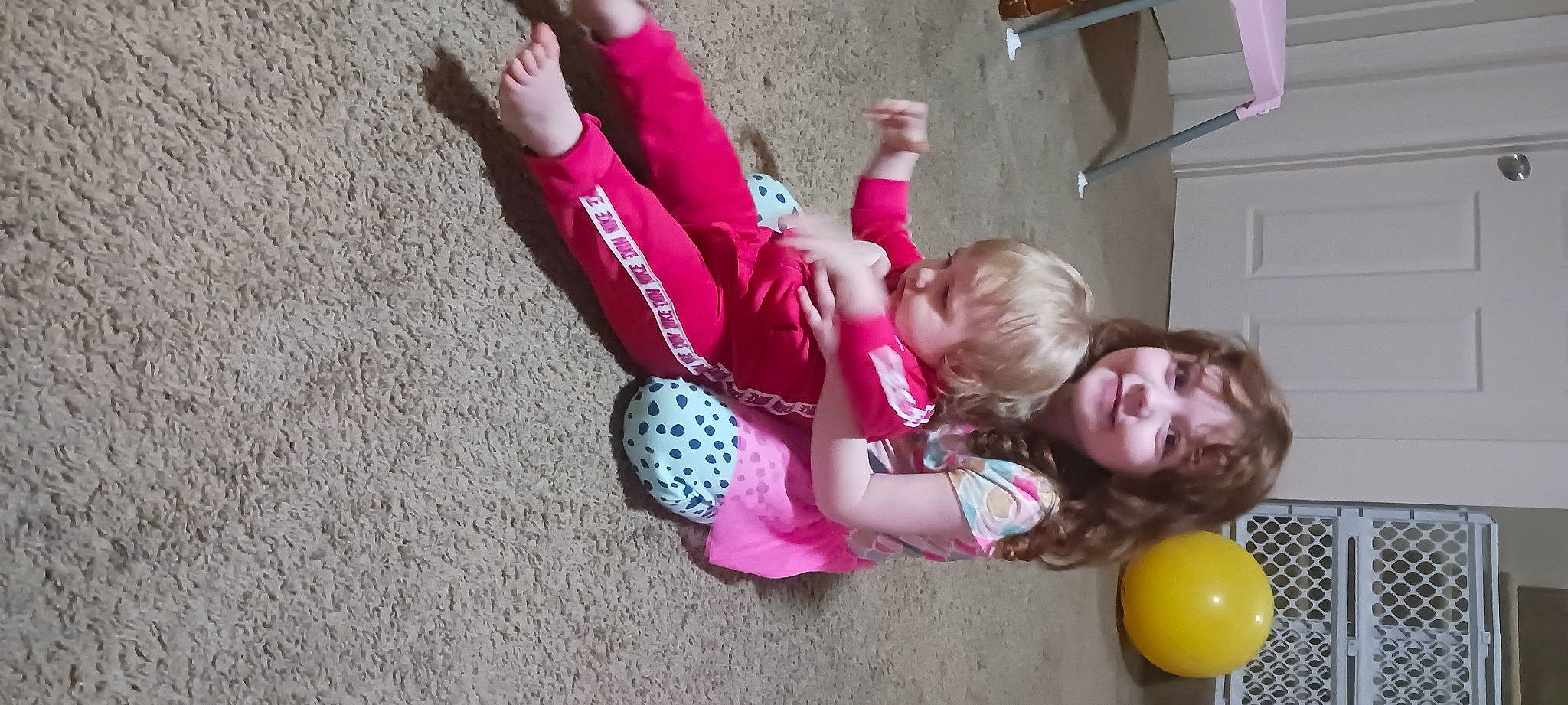 Delilah And Kinzley joined the competition — help win amazing prizes! baby, baby_toddler_clothing, balloon, child, flooring, fun, happy, human_body, human_leg, joy, knee, leg, leisure, person, pink, play, recreation, sitting, sneakers, sock