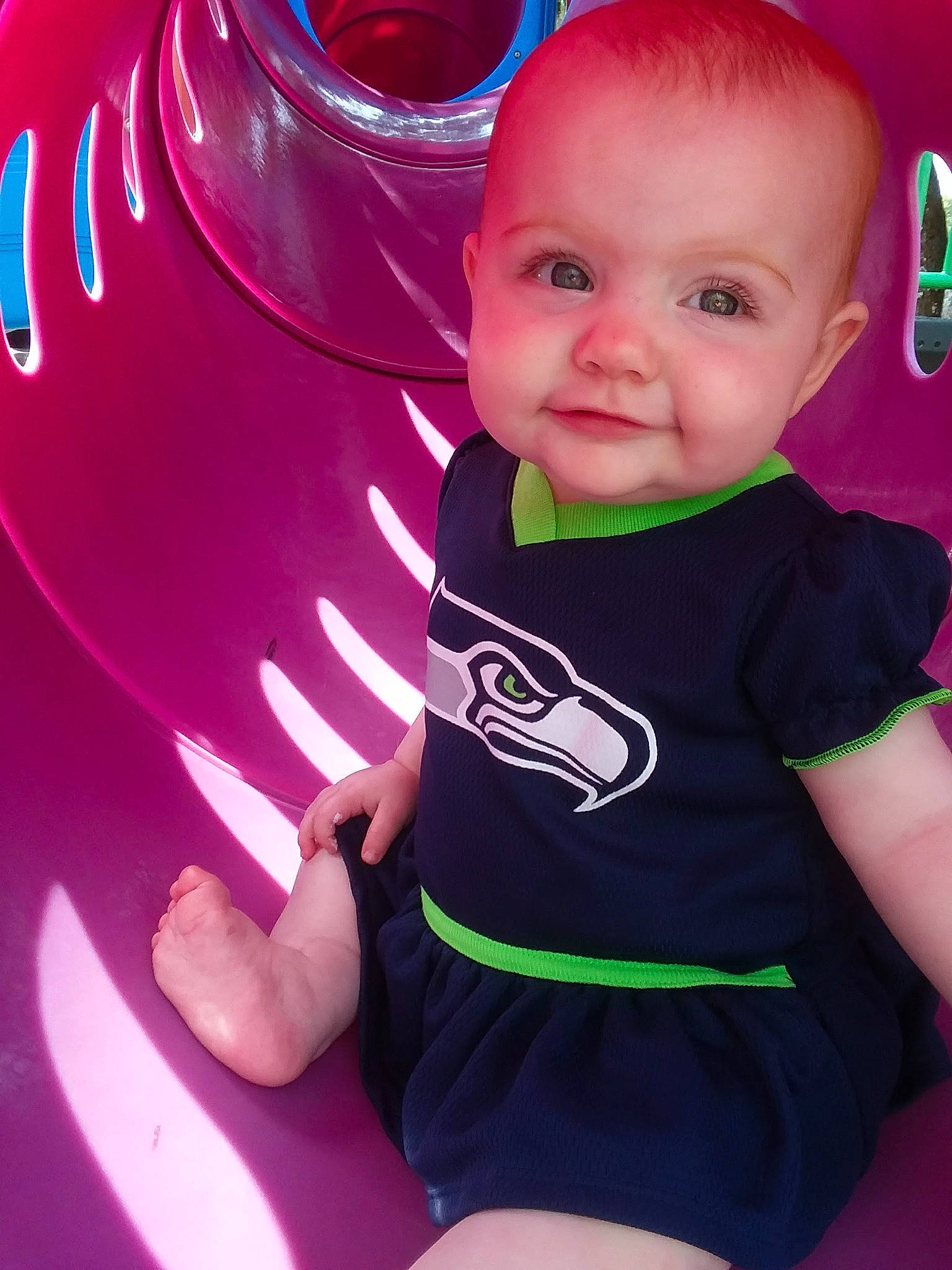 Delilah And Kinzley joined the competition — help win amazing prizes! baby, baby_playing_with_toys, baby_toddler_clothing, blue, child, cool, facial_expression, fun, green, happy, magenta, person, pink, purple, red, sitting, sleeve, smile, t_shirt, thigh