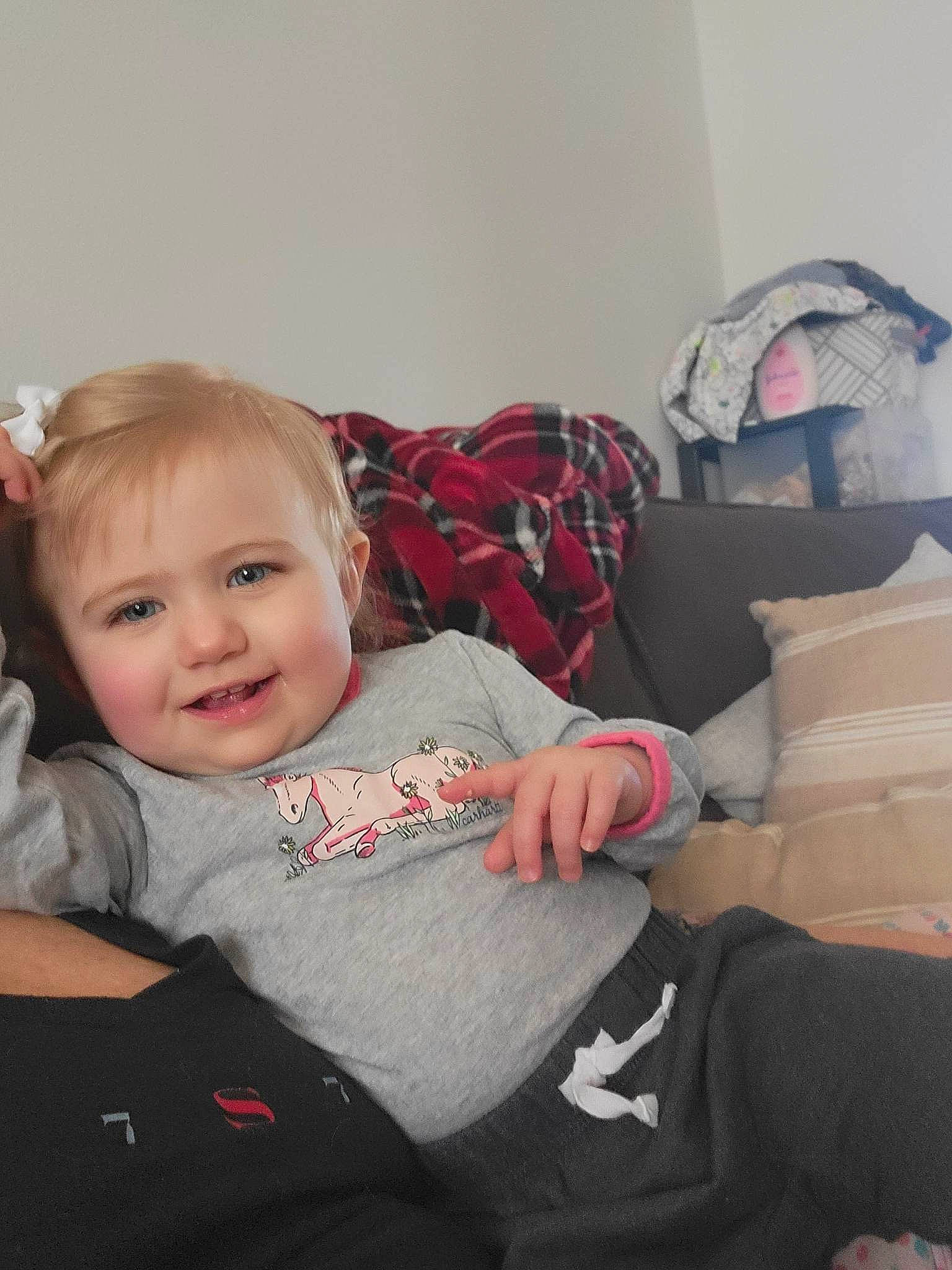 Delilah And Kinzley is registered to the contest to win money with this photo: baby, baby_toddler_clothing, carmine, cheek, child, comfort, elbow, fun, happy, human_leg, joy, knee, lap, person, room, sitting, sleeve, smile, sock, t_shirt