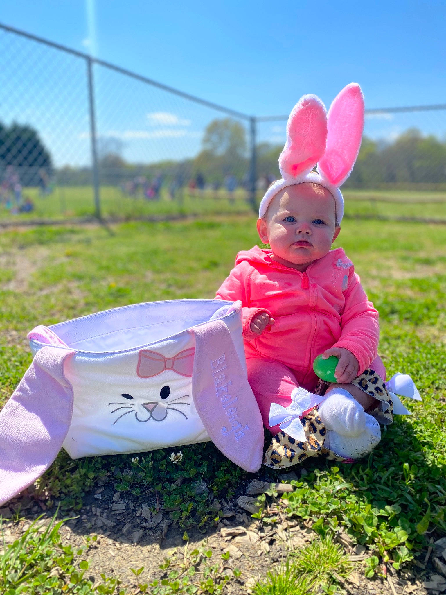 Blakeleigh joined the competition — help win amazing prizes! baby, baby_toddler_clothing, fence, fun, grass, grassland, happy, hat, head, headgear, meadow, morning, people_in_nature, person, pink, plant, recreation, sky, summer, toddler