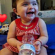 Ava joined the competition — help win amazing prizes! baby, beverage, bodypart, bottle, boy, car, child, face, finger, hand, happy, head, jar, male, person, photography, portrait, sitting, transportation, waterbottle