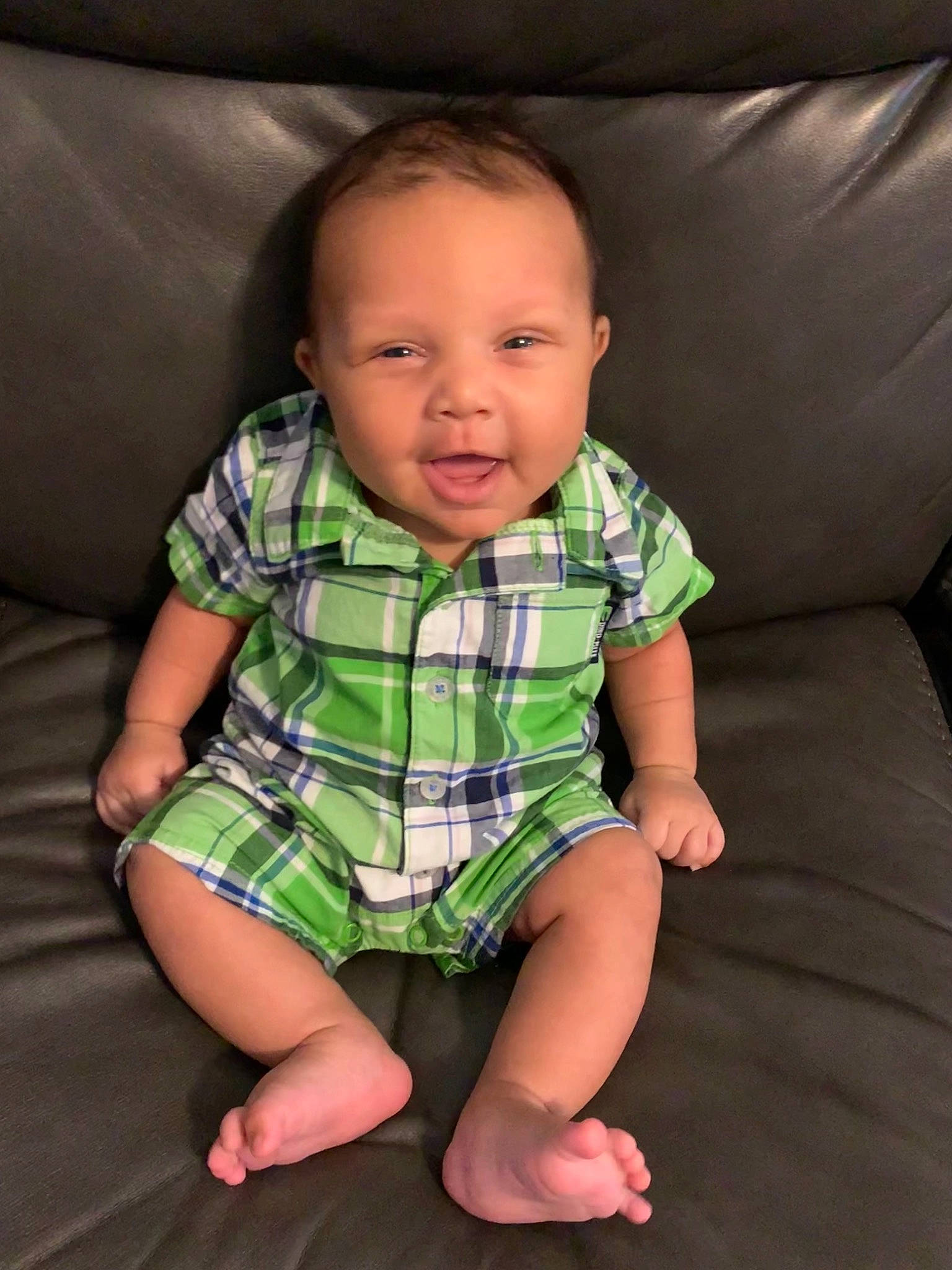 Malikai joined the competition — help win amazing prizes! baby, baby_toddler_clothing, barefoot, cheek, child, comfort, face, finger, flooring, foot, fun, human_body, lap, nose, pattern, person, sitting, skin, sleeve, smile